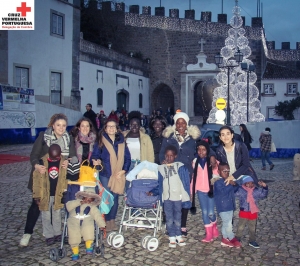 Delegação de Coimbra entrega presente de Natal a duas famílias requerentes de asilo